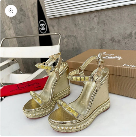 Gold wedge heel